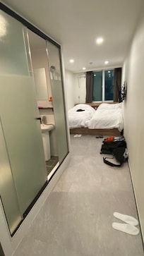 Hotel Room. Nothing fancy but very clean and comfortable. Free bottled water in room, ensuite bathroom, complete kitchen and free laundry facilities available.