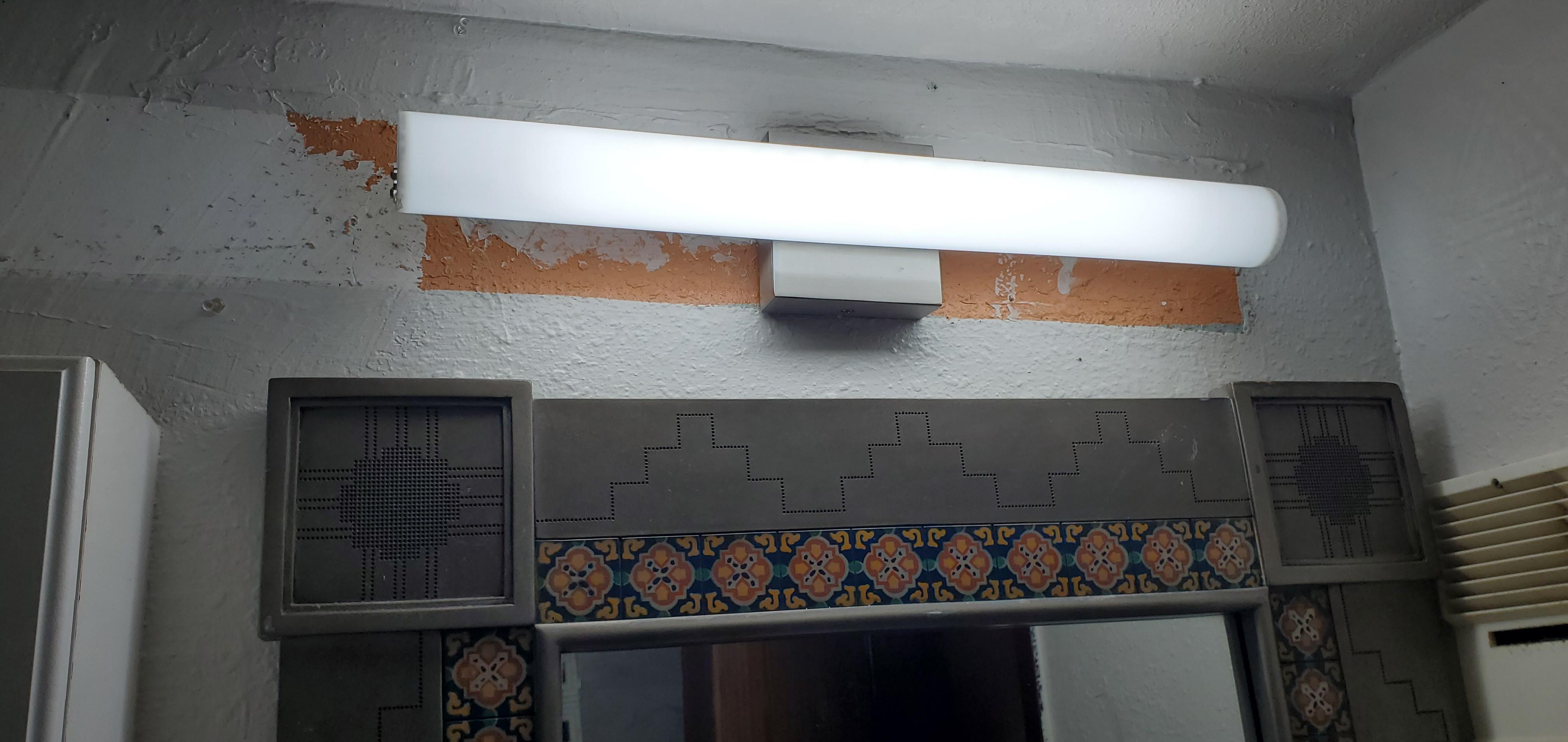 Light was likely replace, but wall not fixed