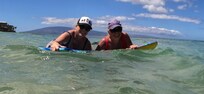 My mom and myself enjoying floating in front of property