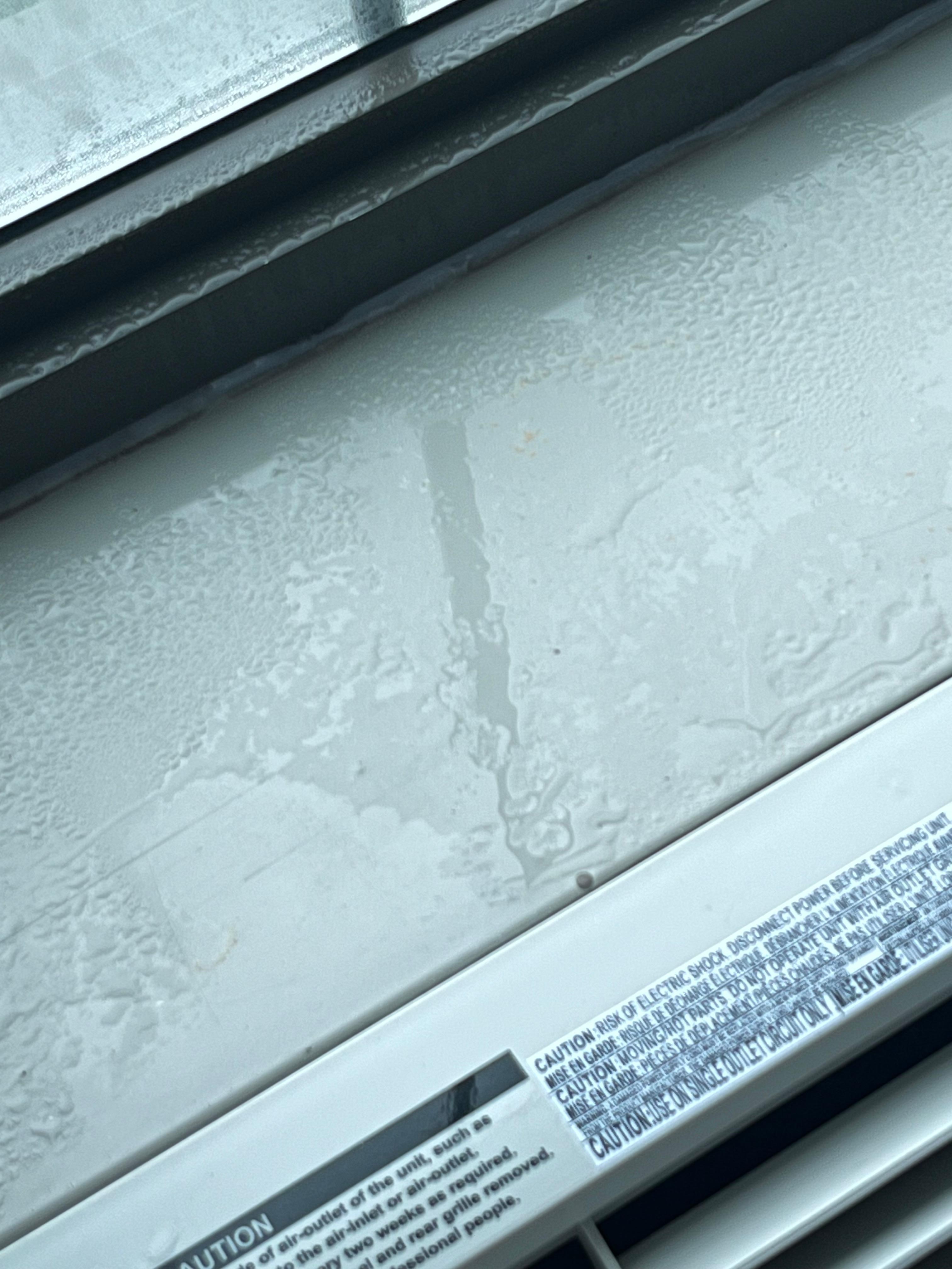 Water collecting on top of air conditioning