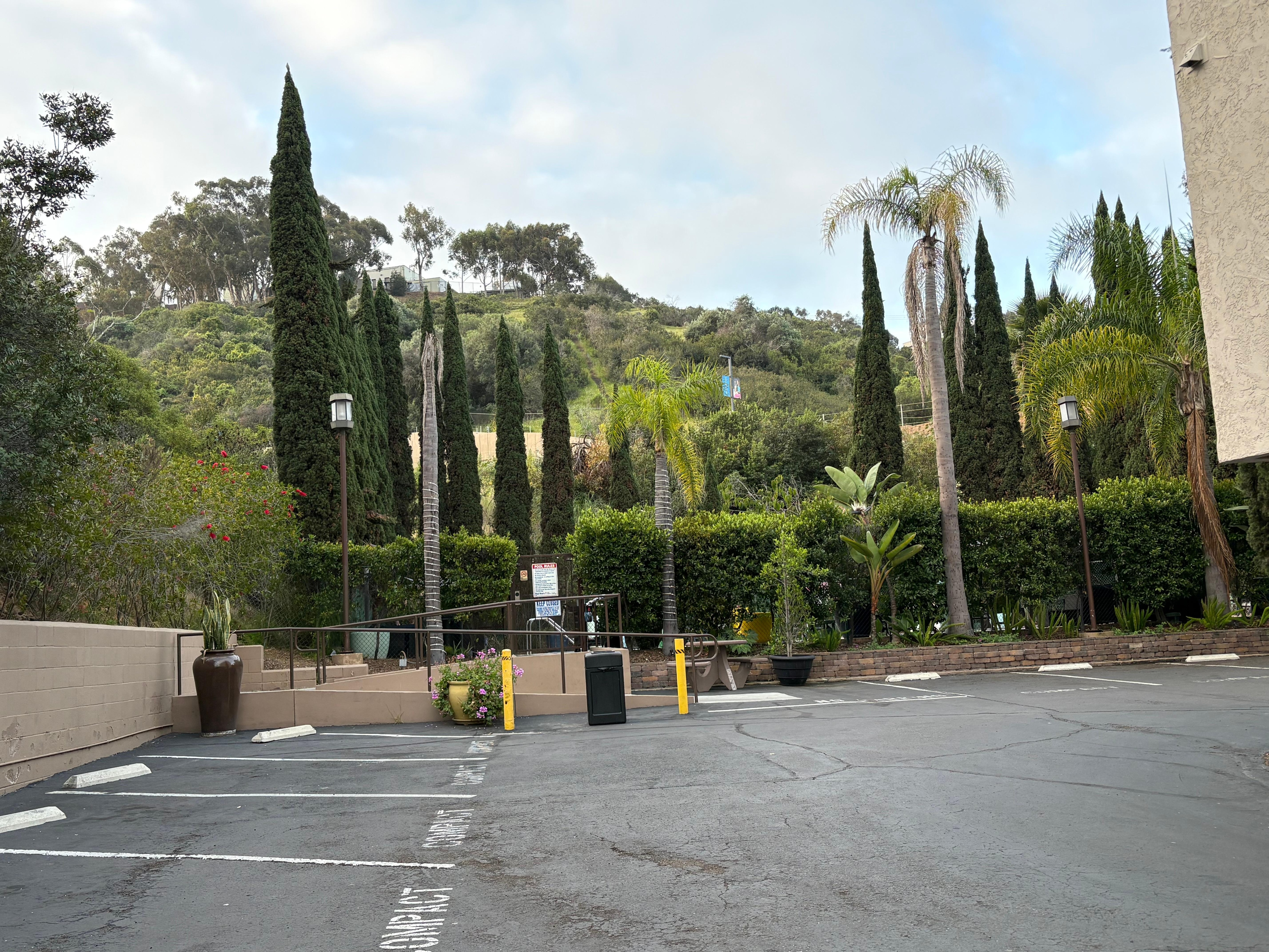 View of the pool area from parking lot