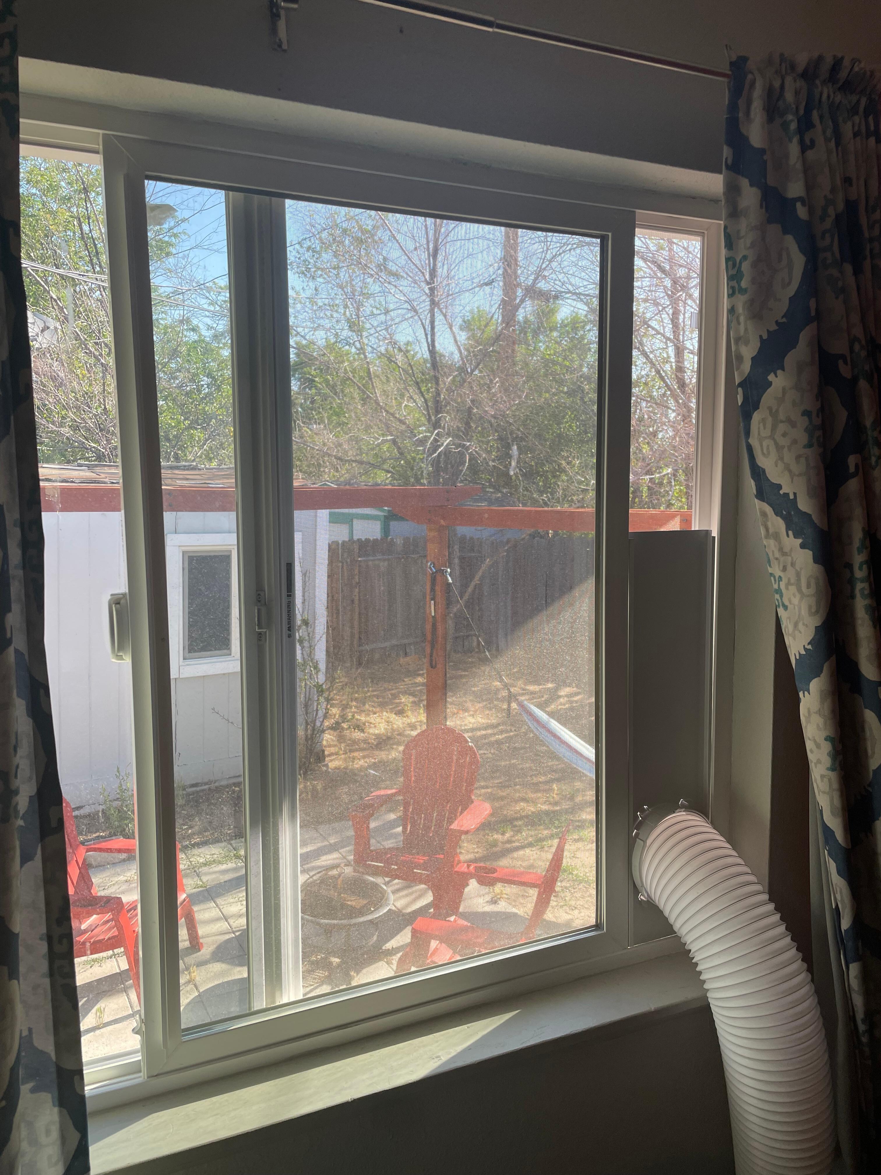 Portable AC unit that can’t be used without hot air coming back into house