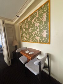 Space to eat / there are shutters that make the room into a 2 bedroom and 2 TVs in room