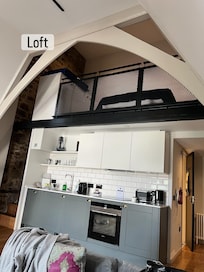 Kitchen and bed area.