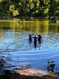 Swimming in the Shenandoah below the house.