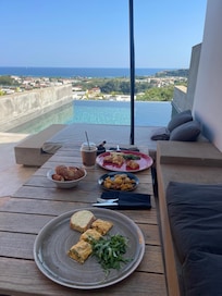 Morning breakfast outside suite by pool