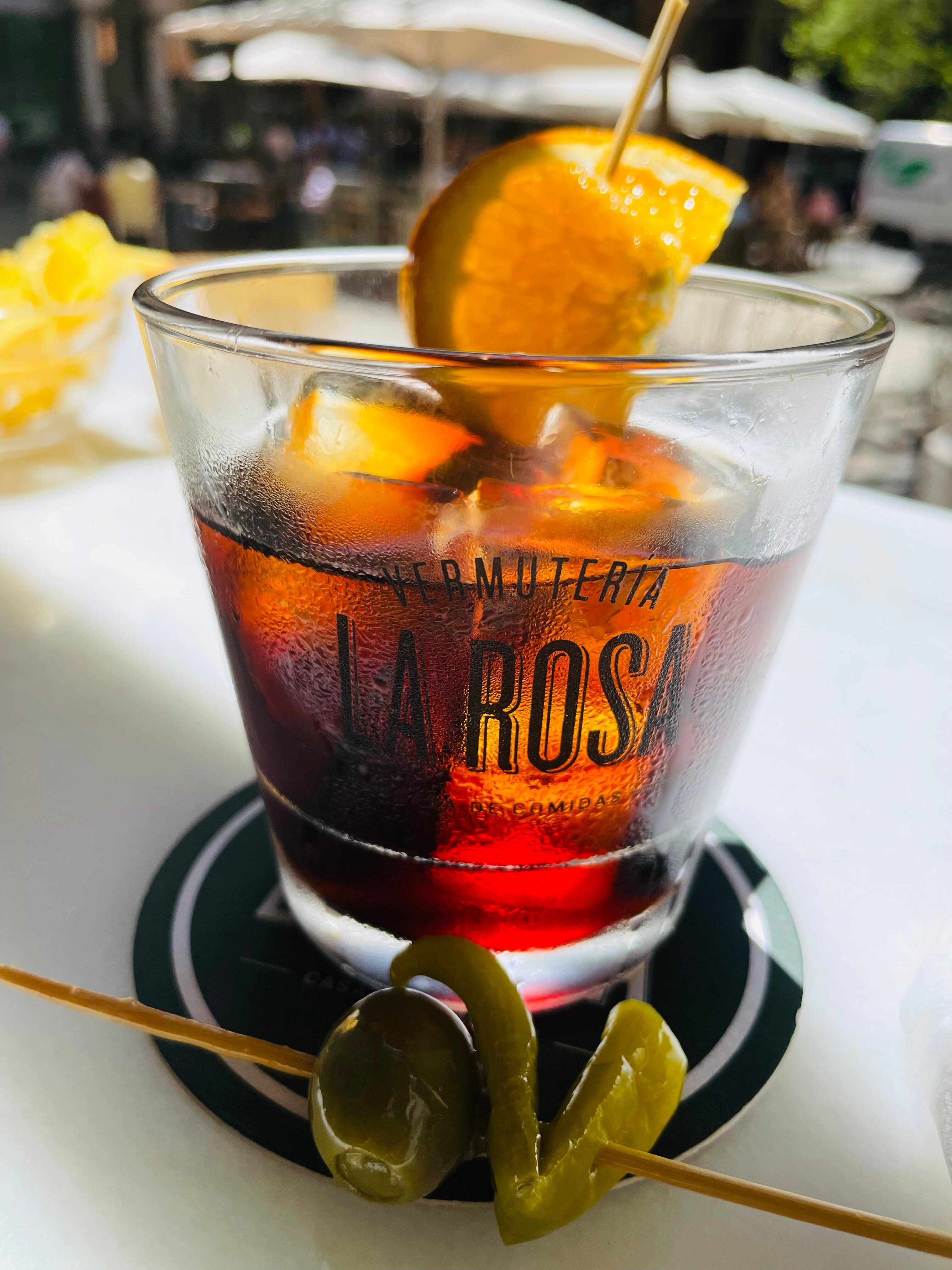 Try tapas and vermut at the vermutteria La Rosa next door