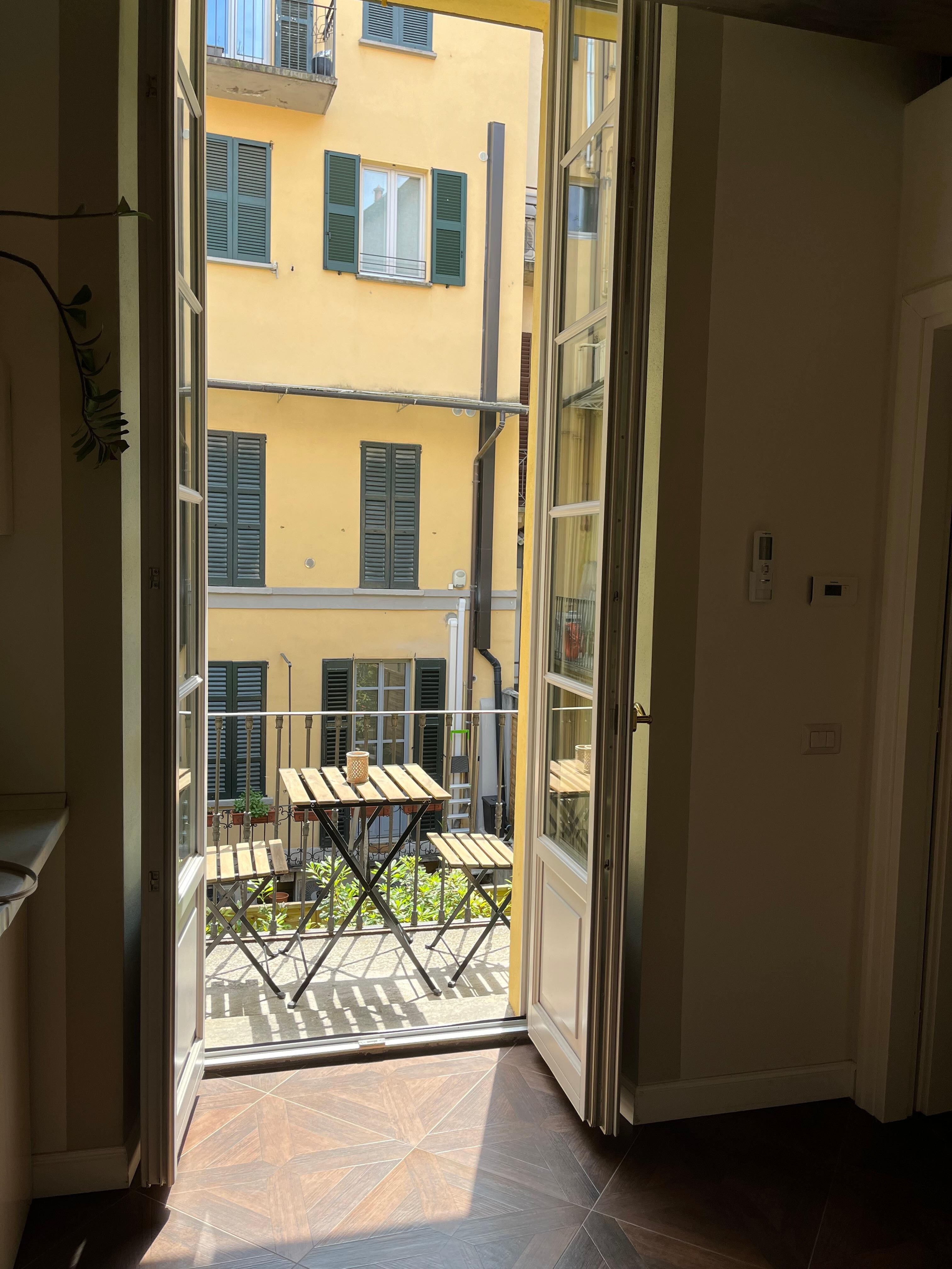 Liten og koselig veranda ut mot bakgården