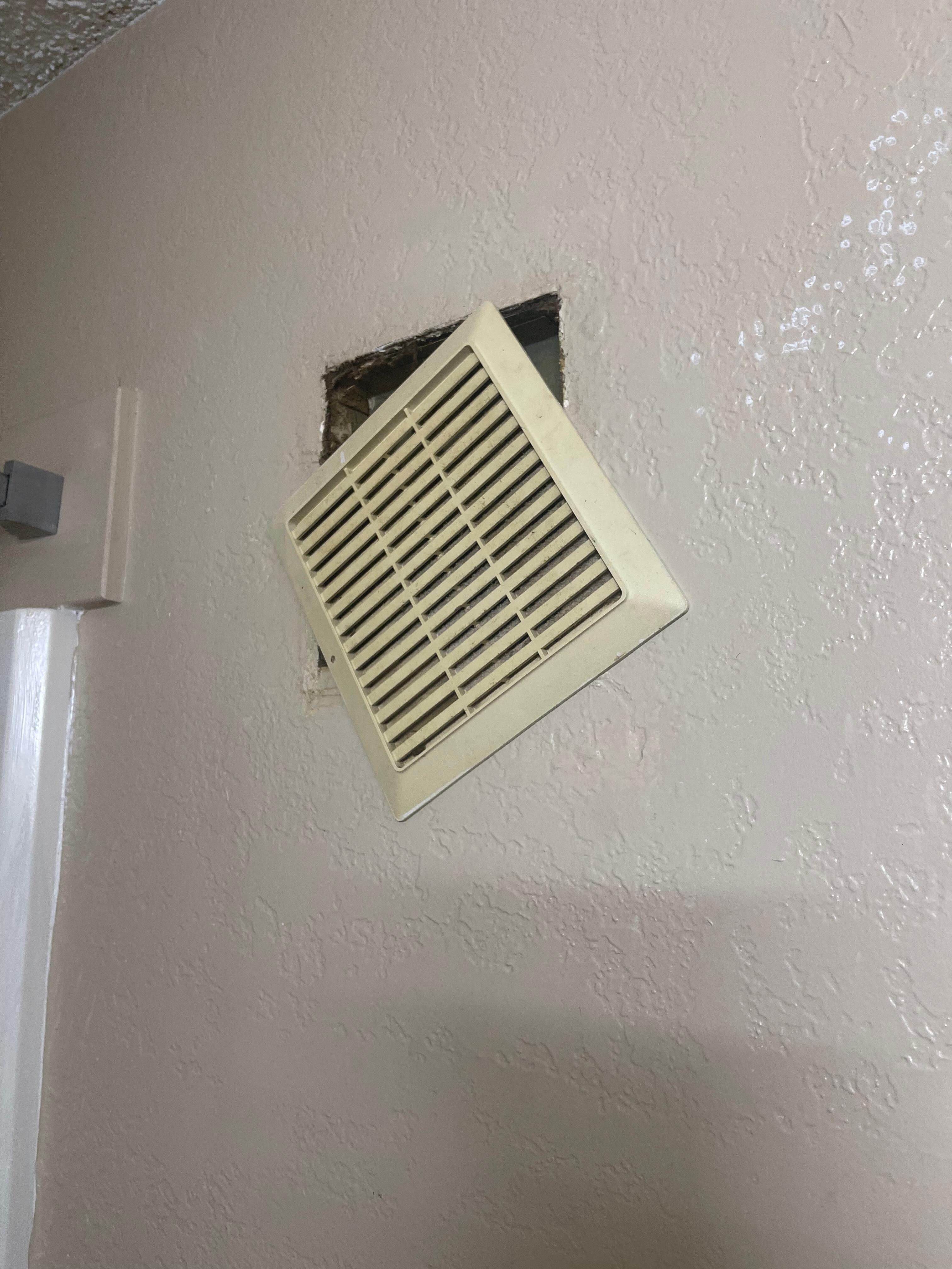 Air vent cover falling off.