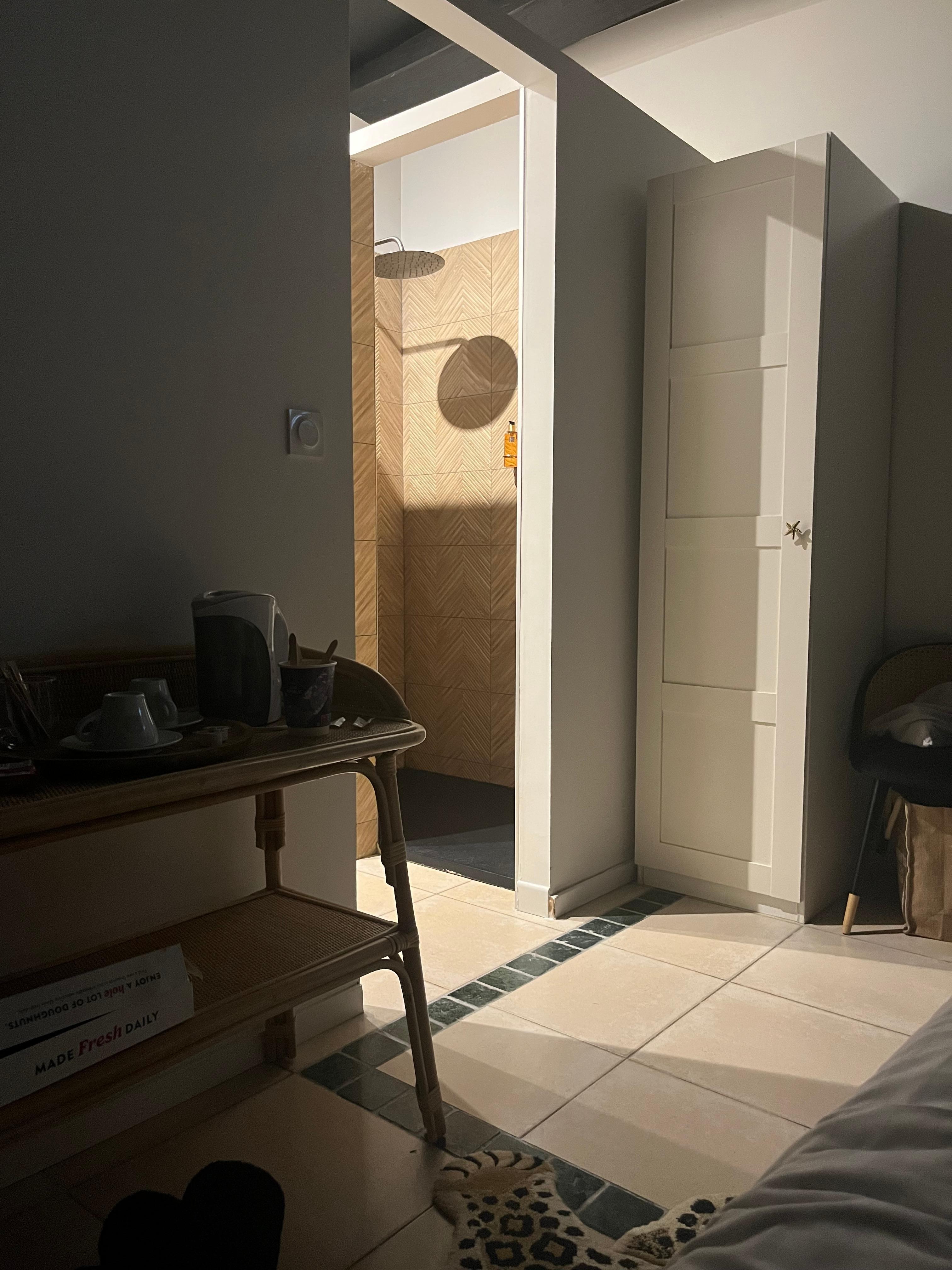 No shower door and very dark