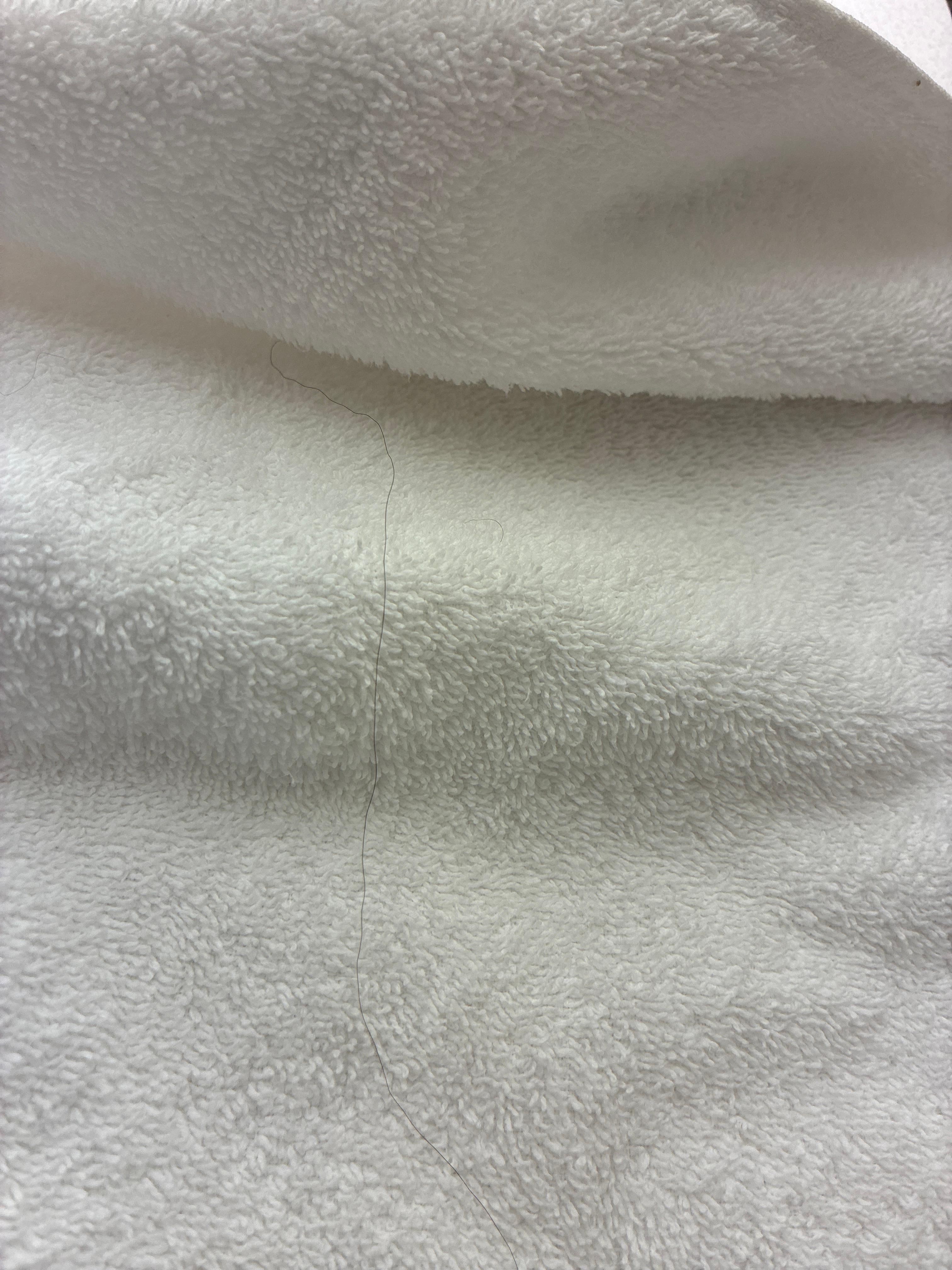Folding towels had hair on it 