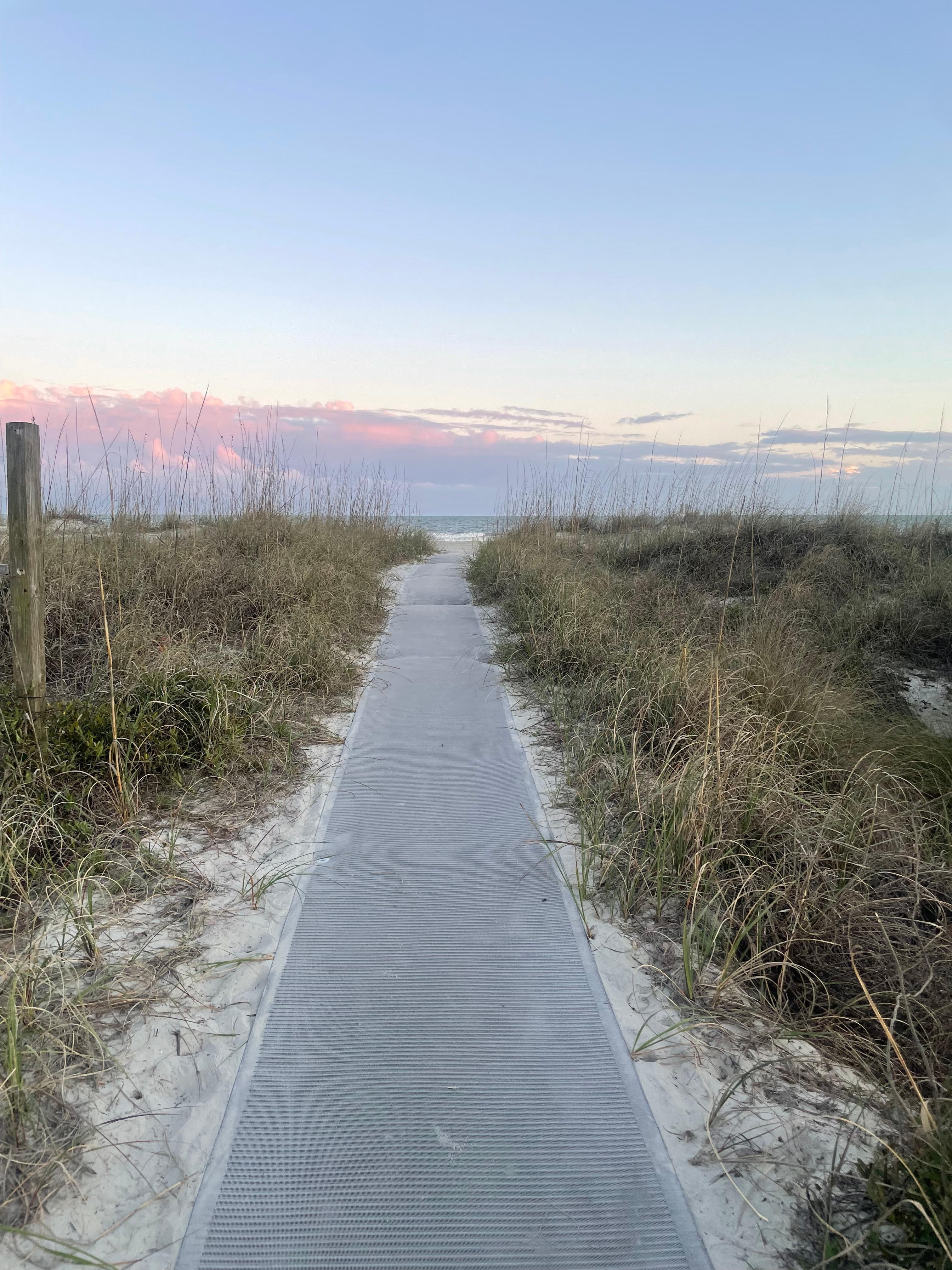 Walkway to beach. Less than 2 min walk if that. 