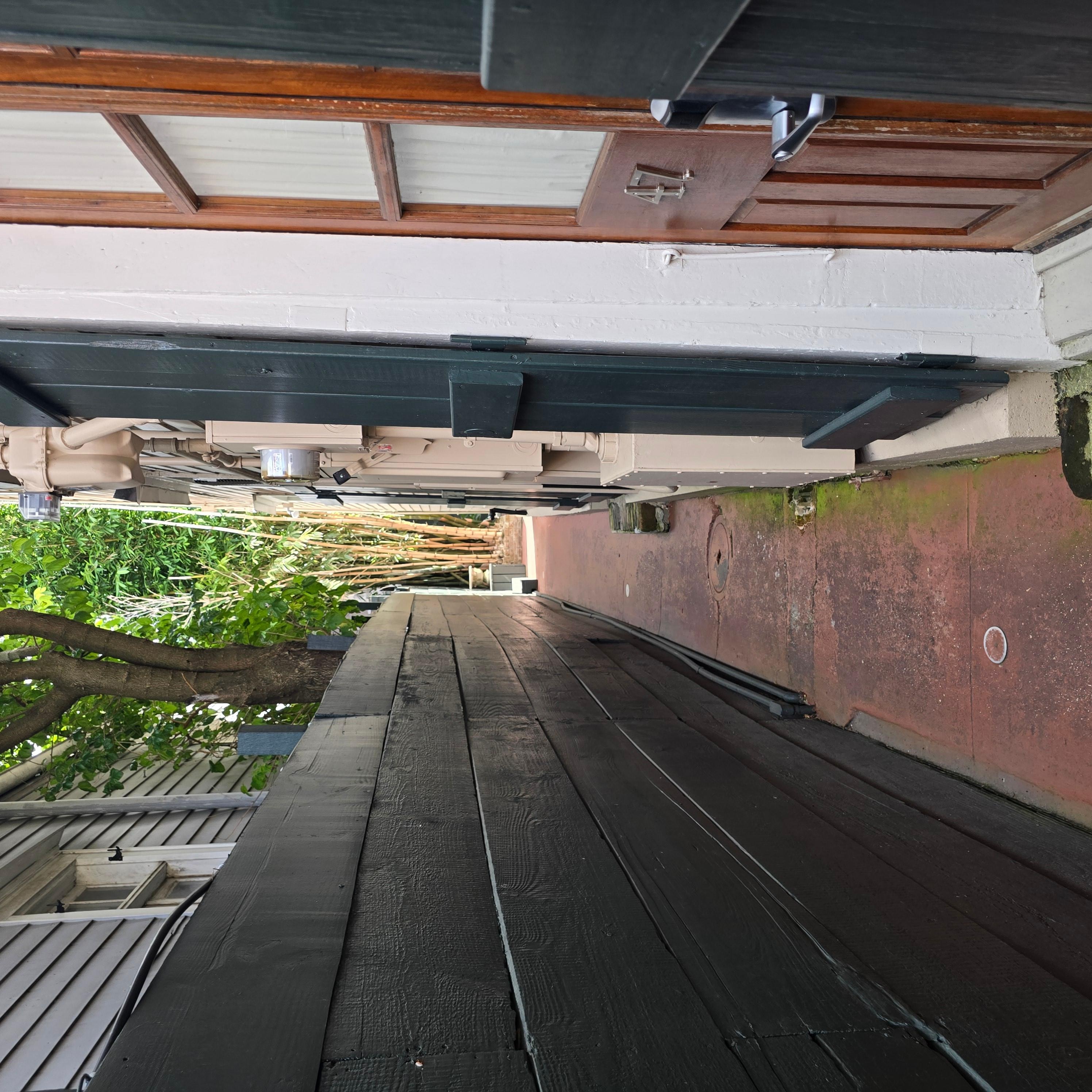Once inside locked entrance. Walkway to room. Well lit at night