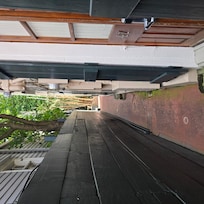 Once inside locked entrance. Walkway to room. Well lit at night
