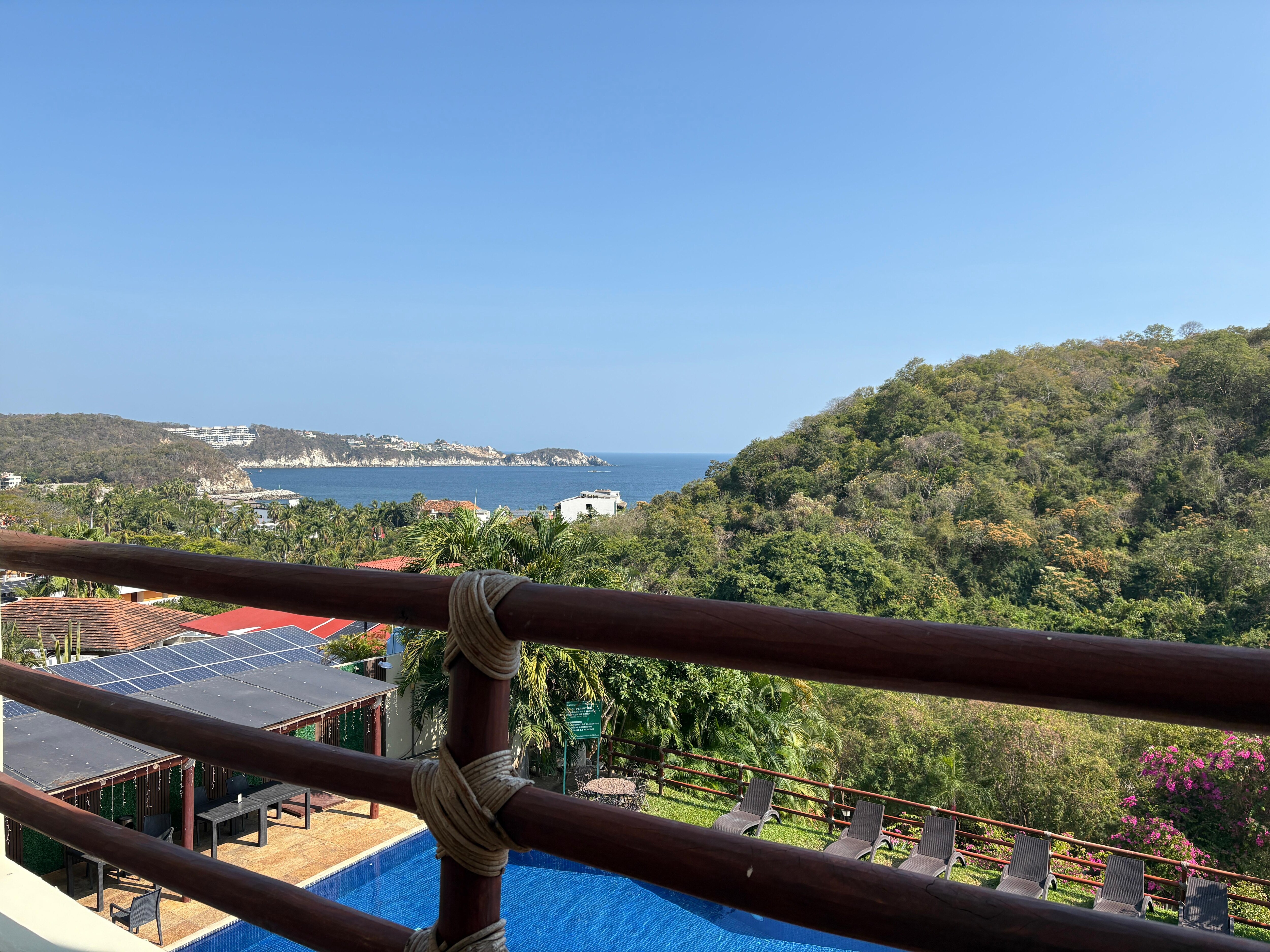 The view from our room’s balcony with the pool foreground. 