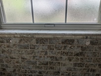 This was in the master bathroom. Looks like a towel rack was here at one time.