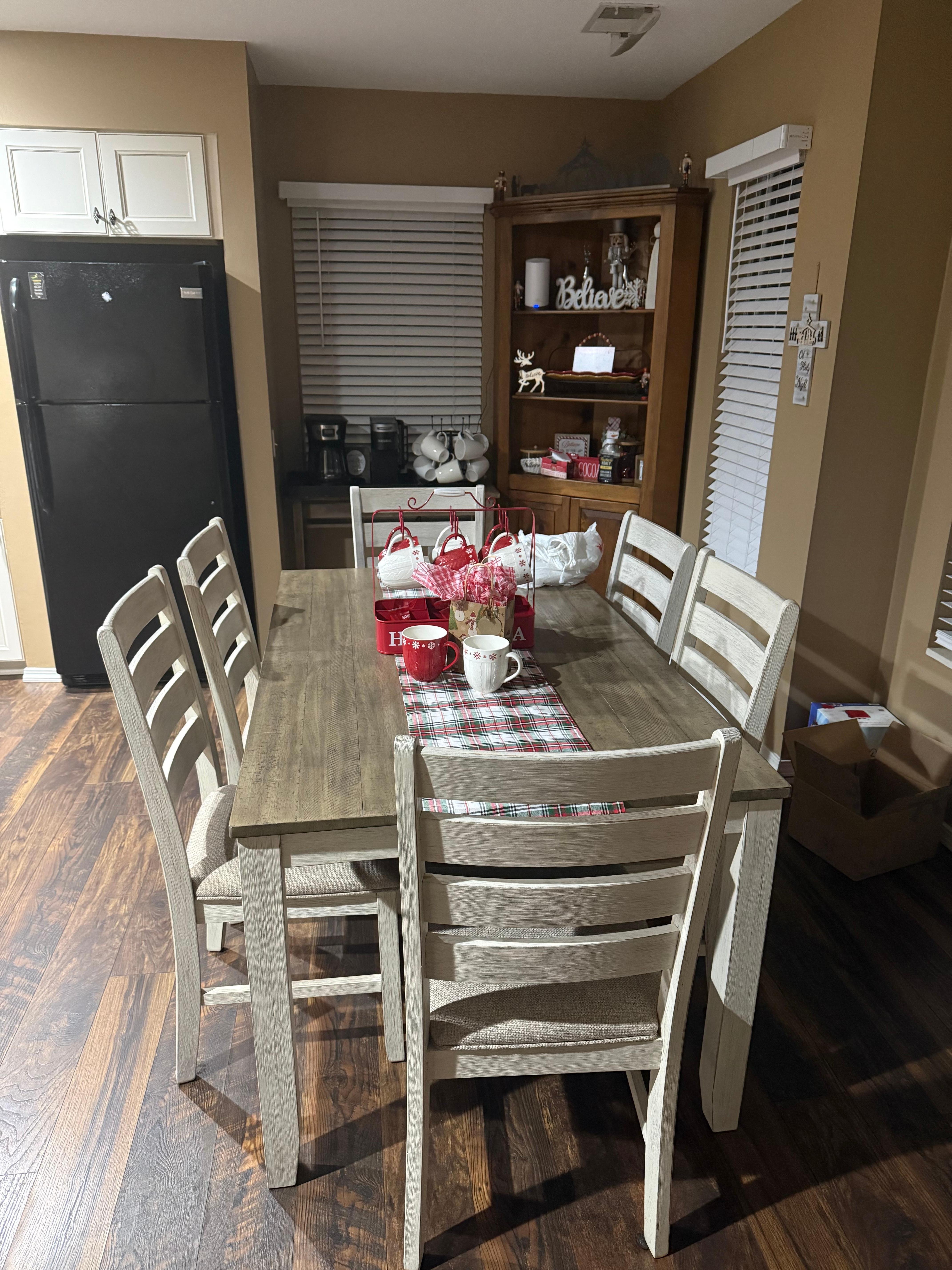 The makings for hot chocolate along with fully stocked coffee bar 