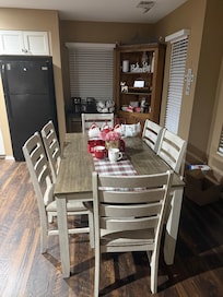 The makings for hot chocolate along with fully stocked coffee bar