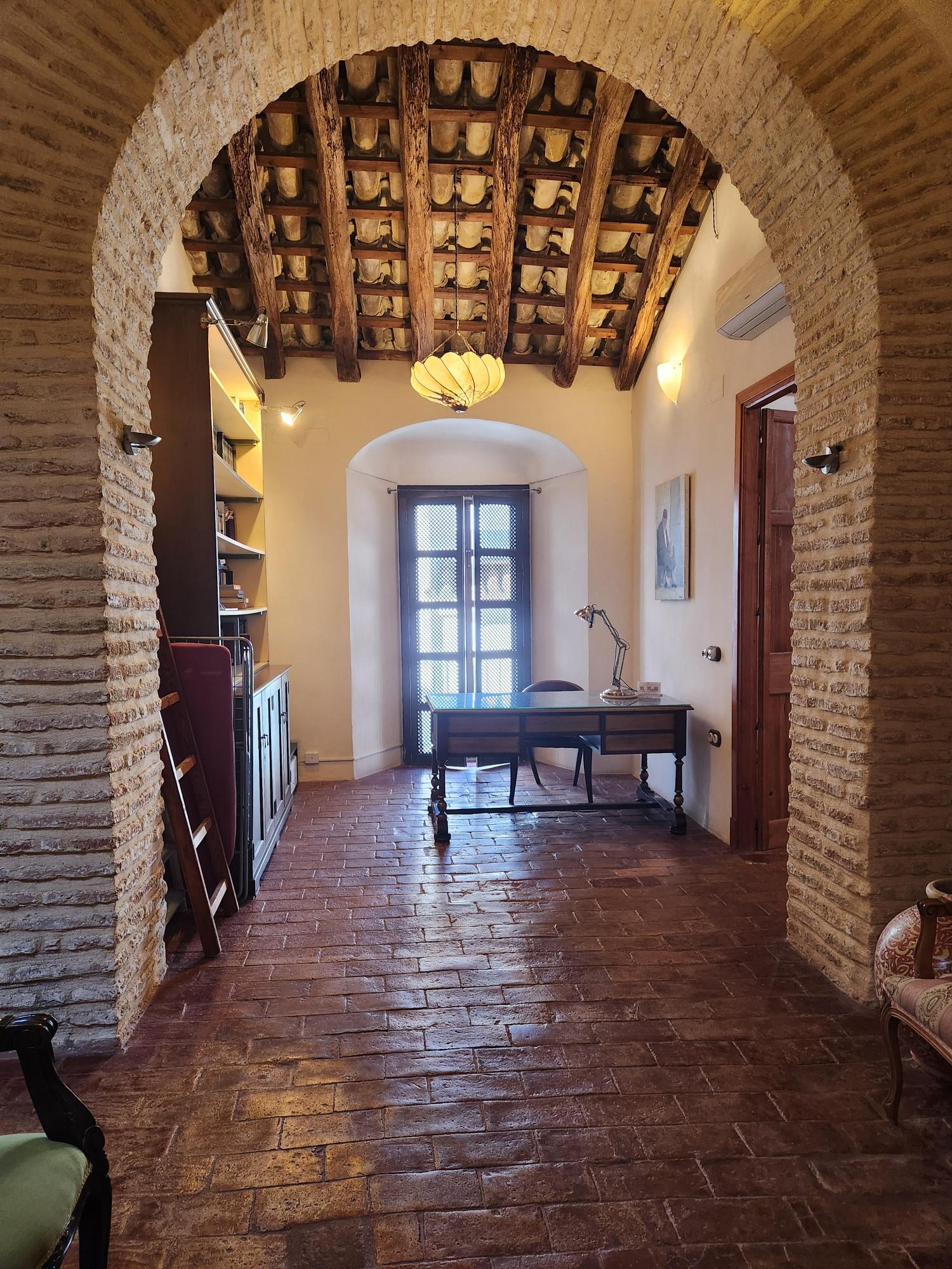 This is the upstairs hall, from which you can access the roof terrace.Check out the details of the ceiling beams.