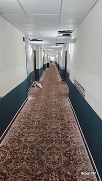 Walking to the room from the elevator.