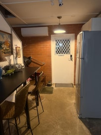 a very small hallway to connect 3 bedrooms, the ceiling is low. It smell bad like mold due to moisture, and room window couldn't open.