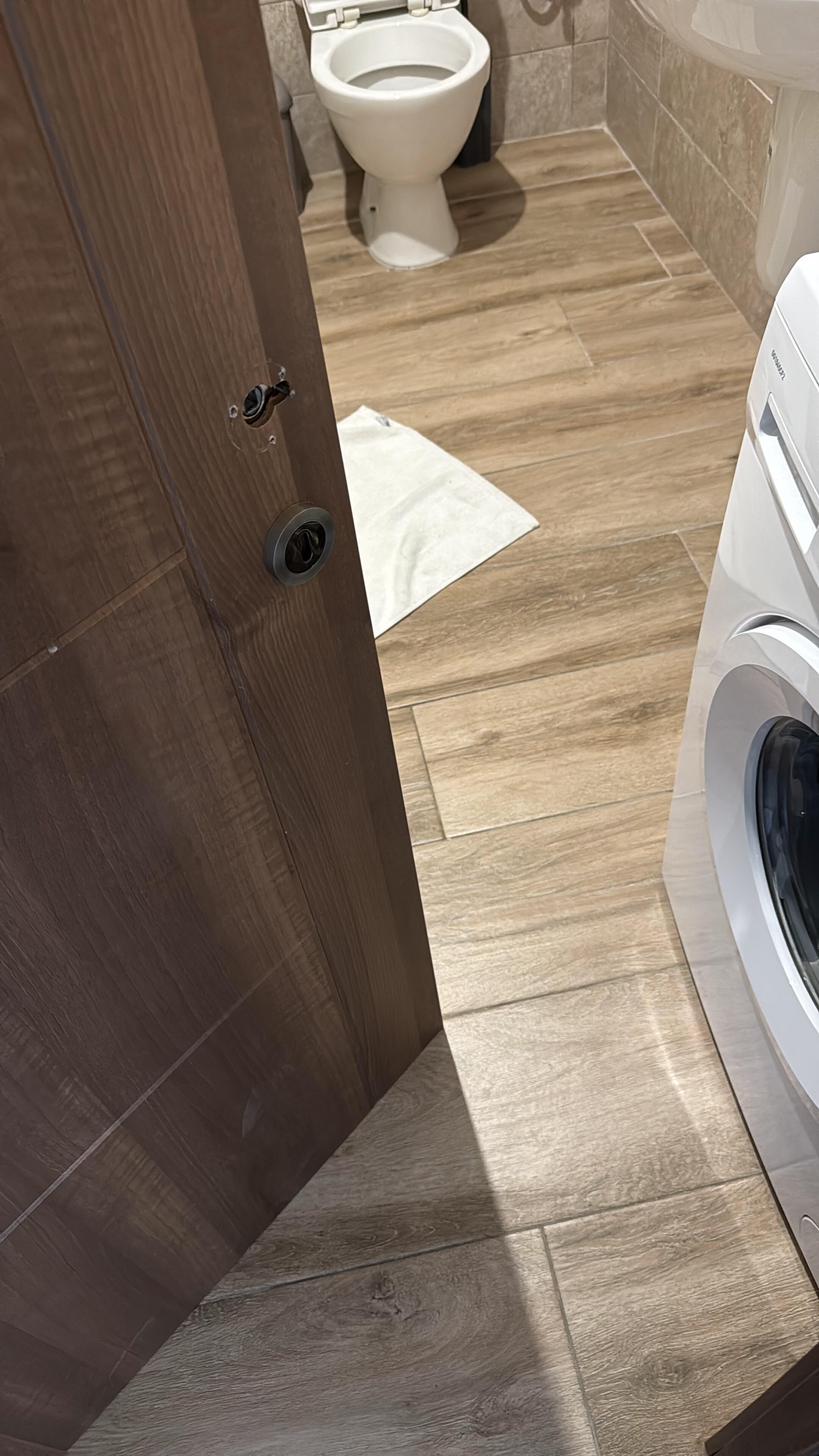 Bathroom door rubbing .. very hard to open fully