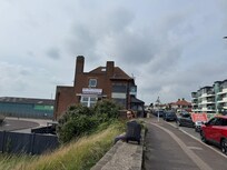 View of the hotels location to the road and port view.