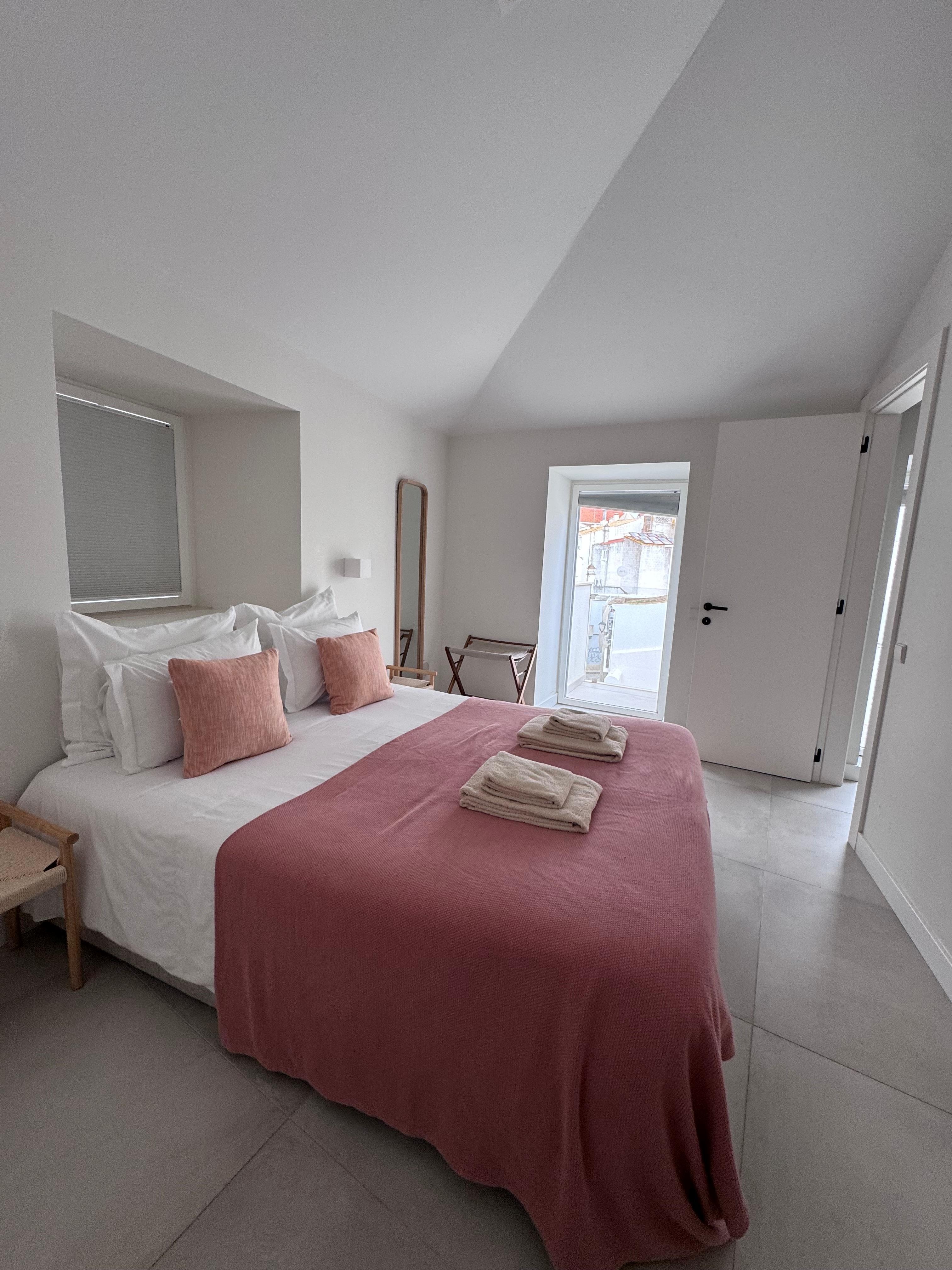 Clean and beautiful bedroom with a view!