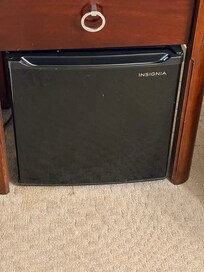 Refrigerator right next to bed ran loudly all night long