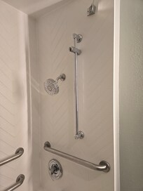 Showerhead height.There is a spot for a hand-held, but no hand-held available.