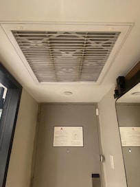 Filthy air filter area above the entrance way.