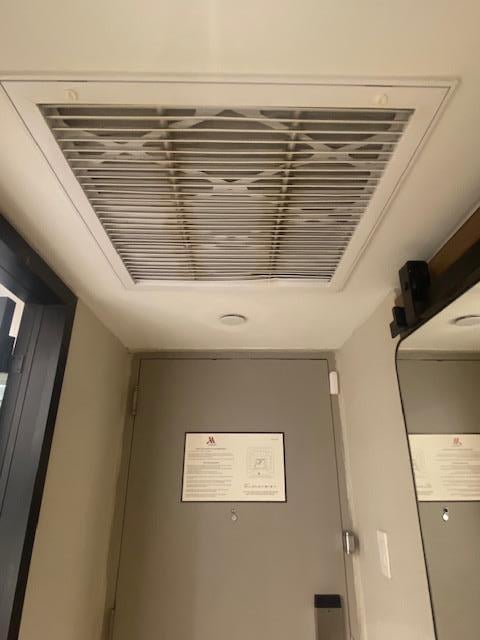 Filthy air filter area above the entrance way.