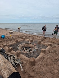 Adult beach day. We built this at the beach and had a fire.