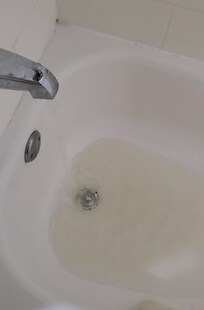 Bath tub Brown water