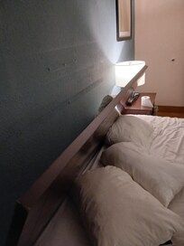 Headboard leaning over