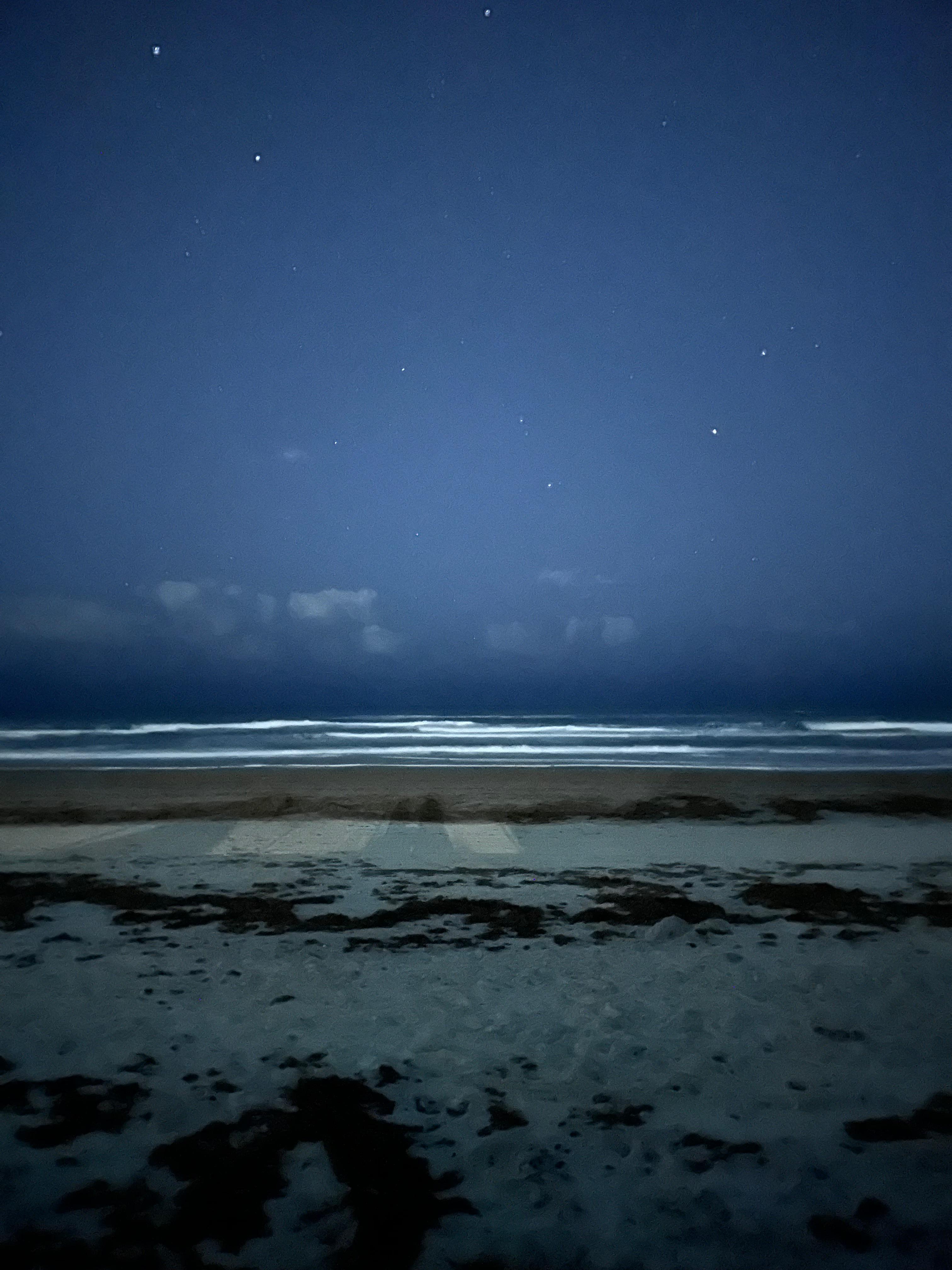 On the beach at night