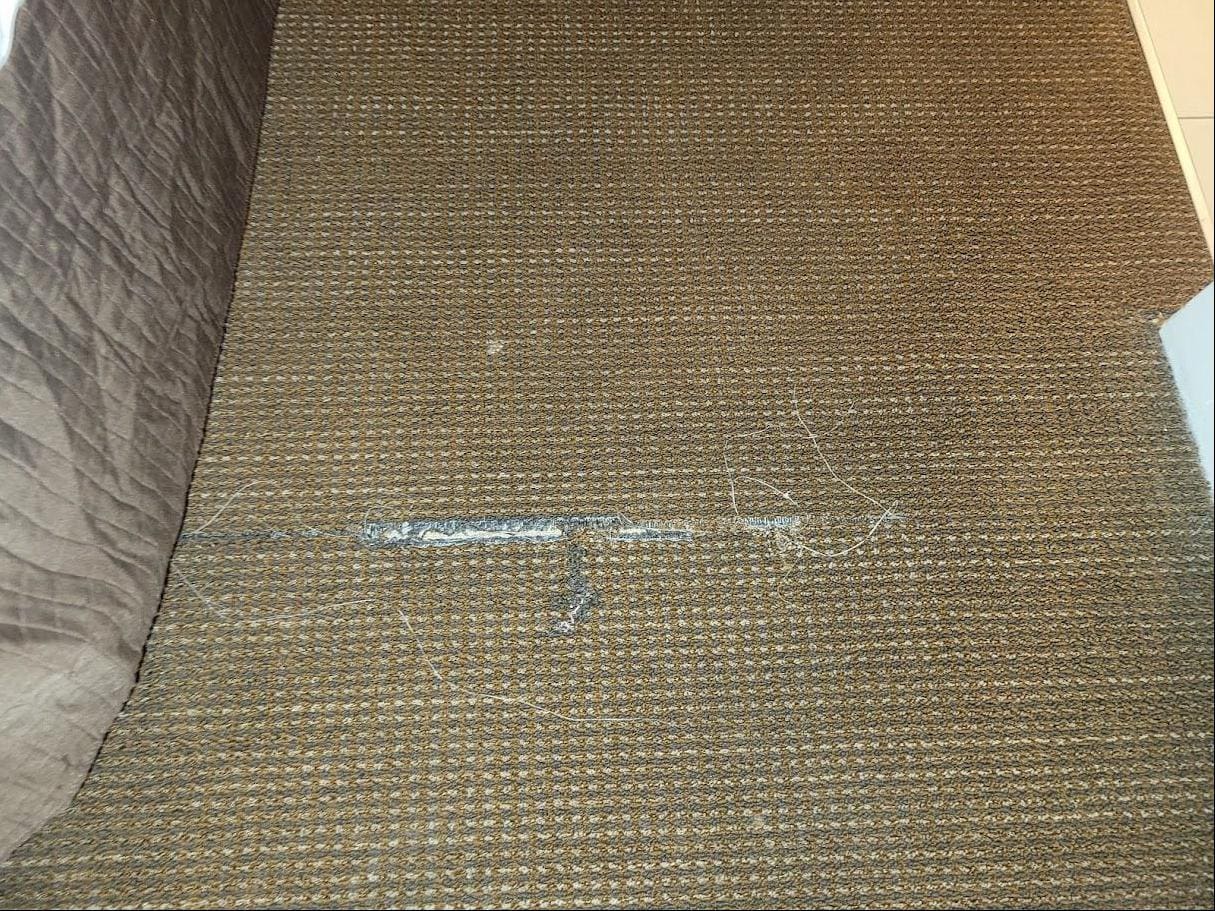 Big tears in carpet.  Needs to be replaced