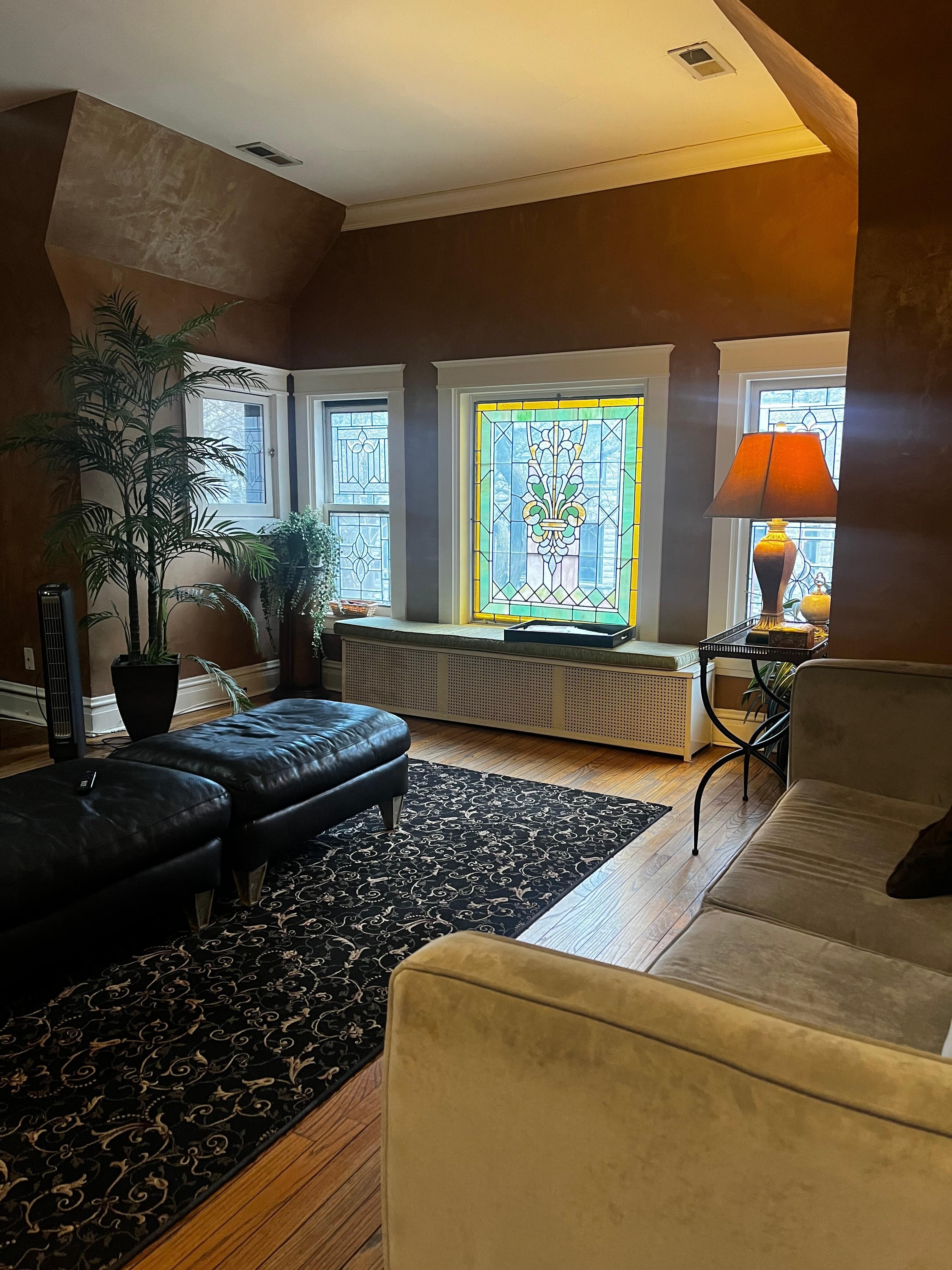 Living room area with plenty of seating and a pullout sofa