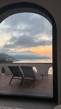 Sunrise looking out on terrace from bedroom