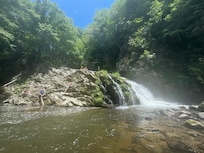 Waterfall with swimming hole and we were able to jump of those cliffs!