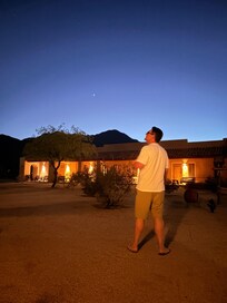 Watching the sunset from outside of our door.