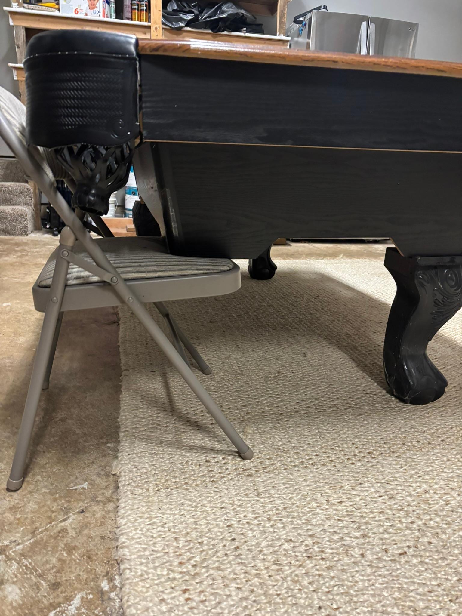 Pool table in the garage is a hazard and not safe for children or adults for that matter