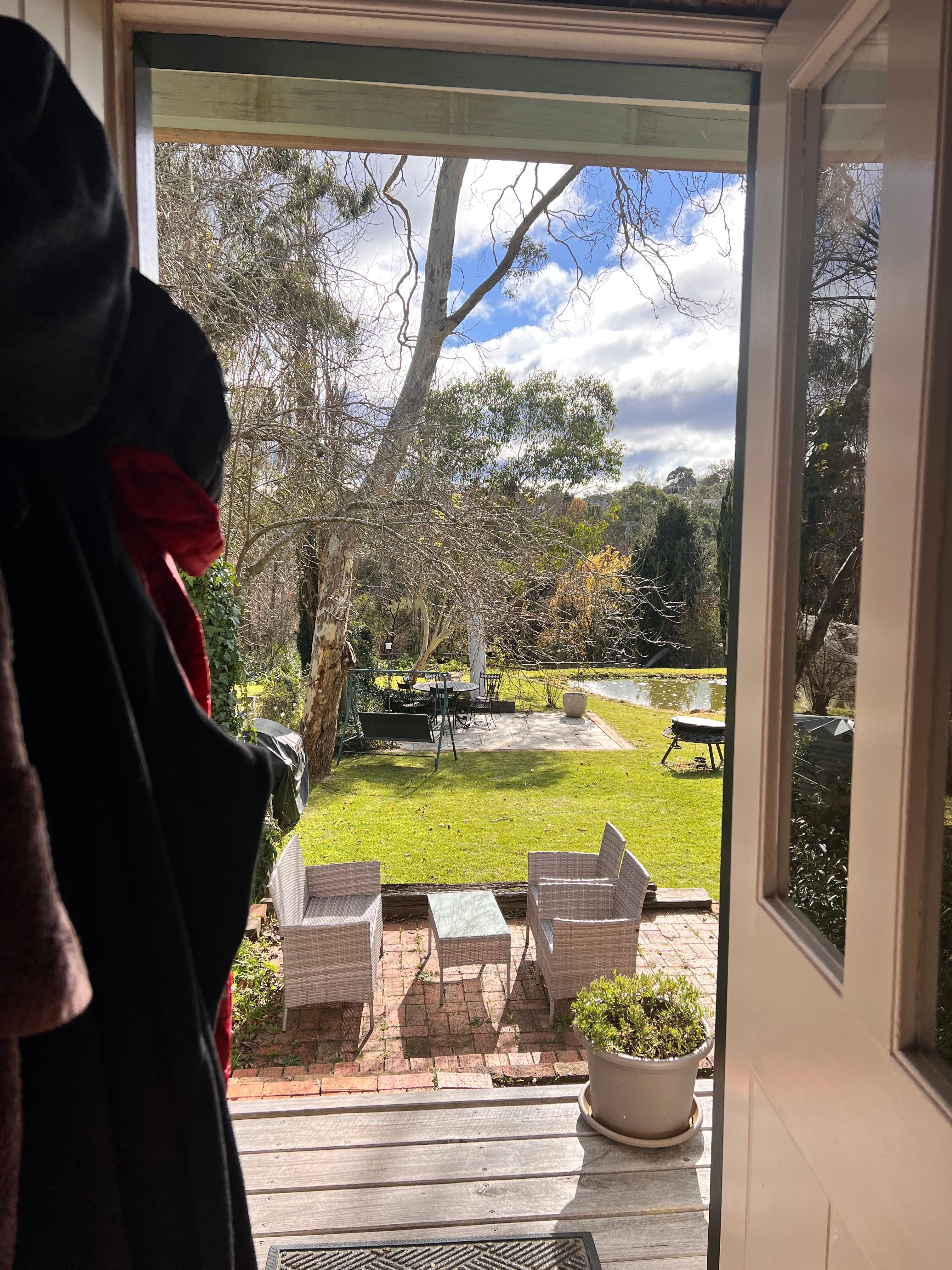 View from cottage to backyard & river 