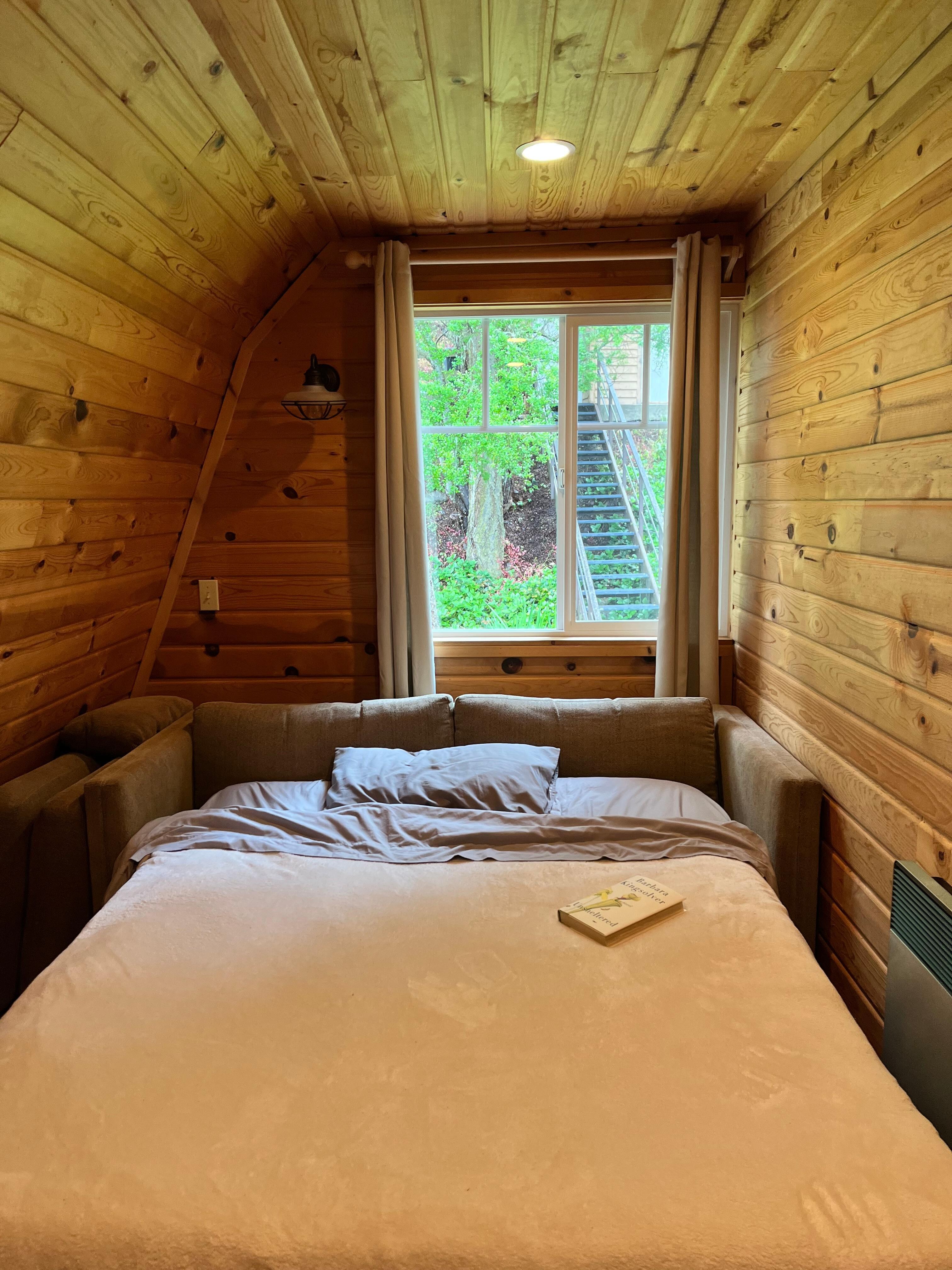 Upstairs bedroom, so cozy and comfortable. Perfect for one person.