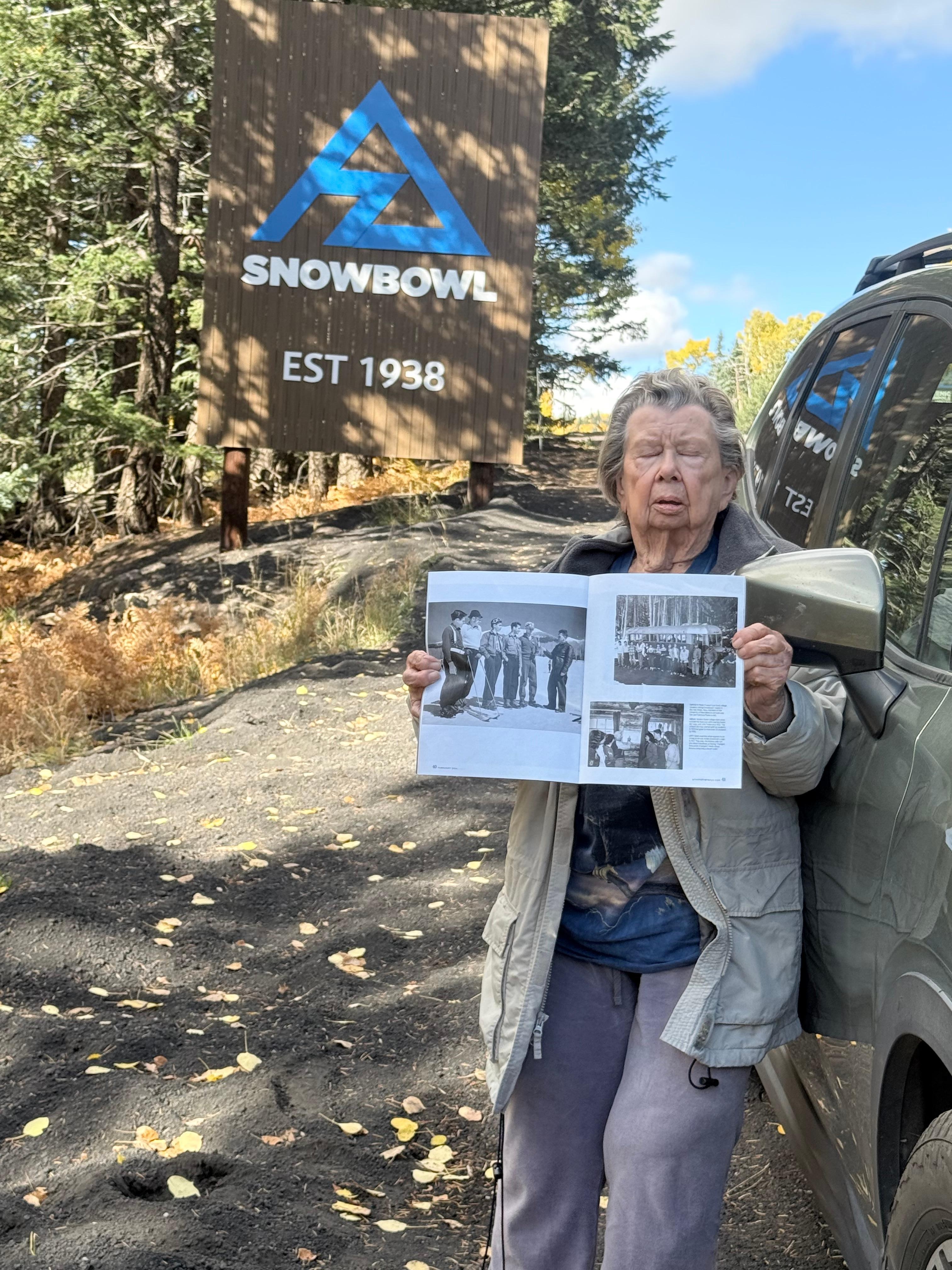 My mom is standing in front of the bus. Very early NAU ski team when it was NAC