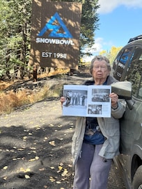 My mom is standing in front of the bus. Very early NAU ski team when it was NAC