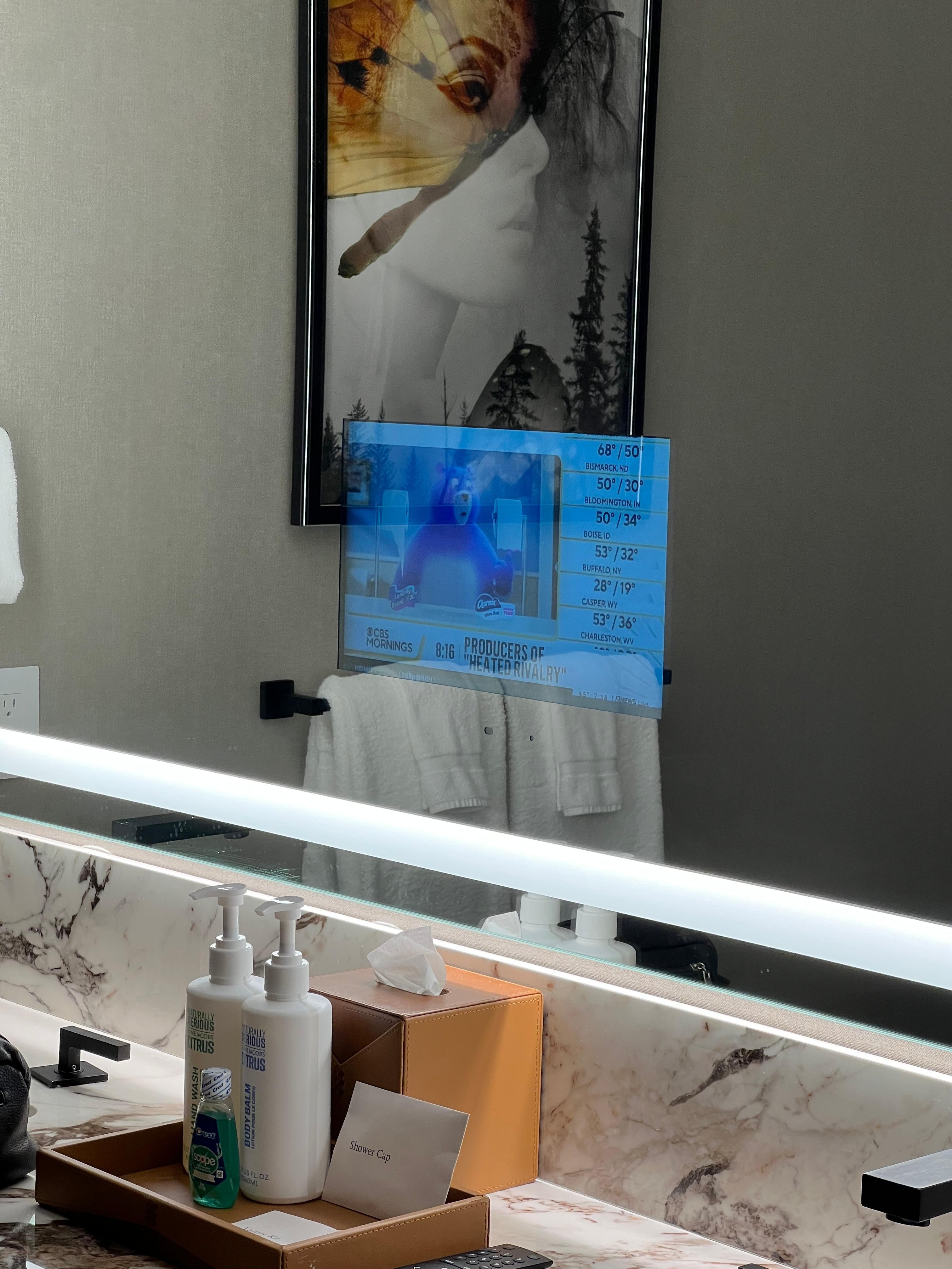 Tv on bathroom mirror was top!