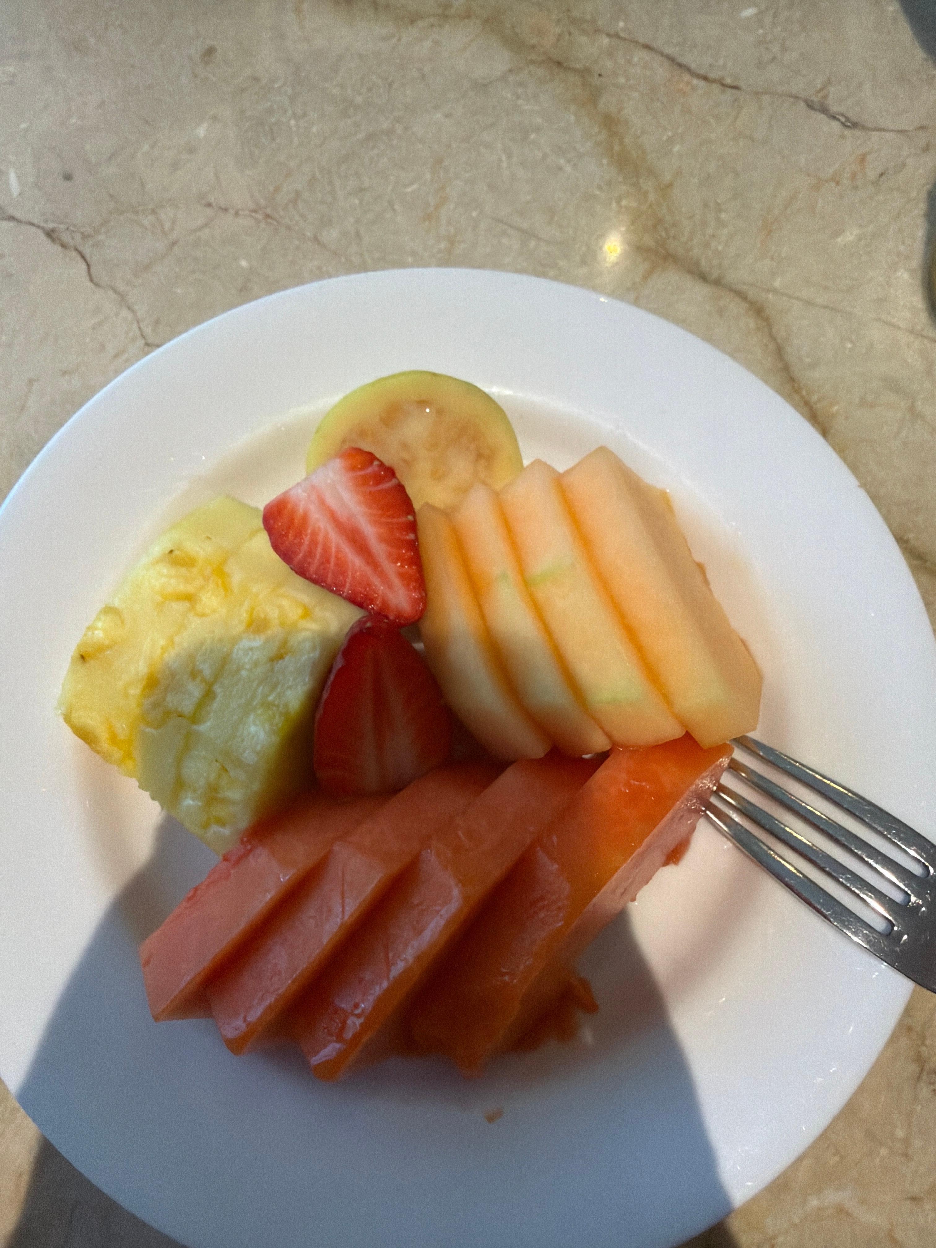Breakfast was delicious fruit and bread included with a glass of orange juice.
