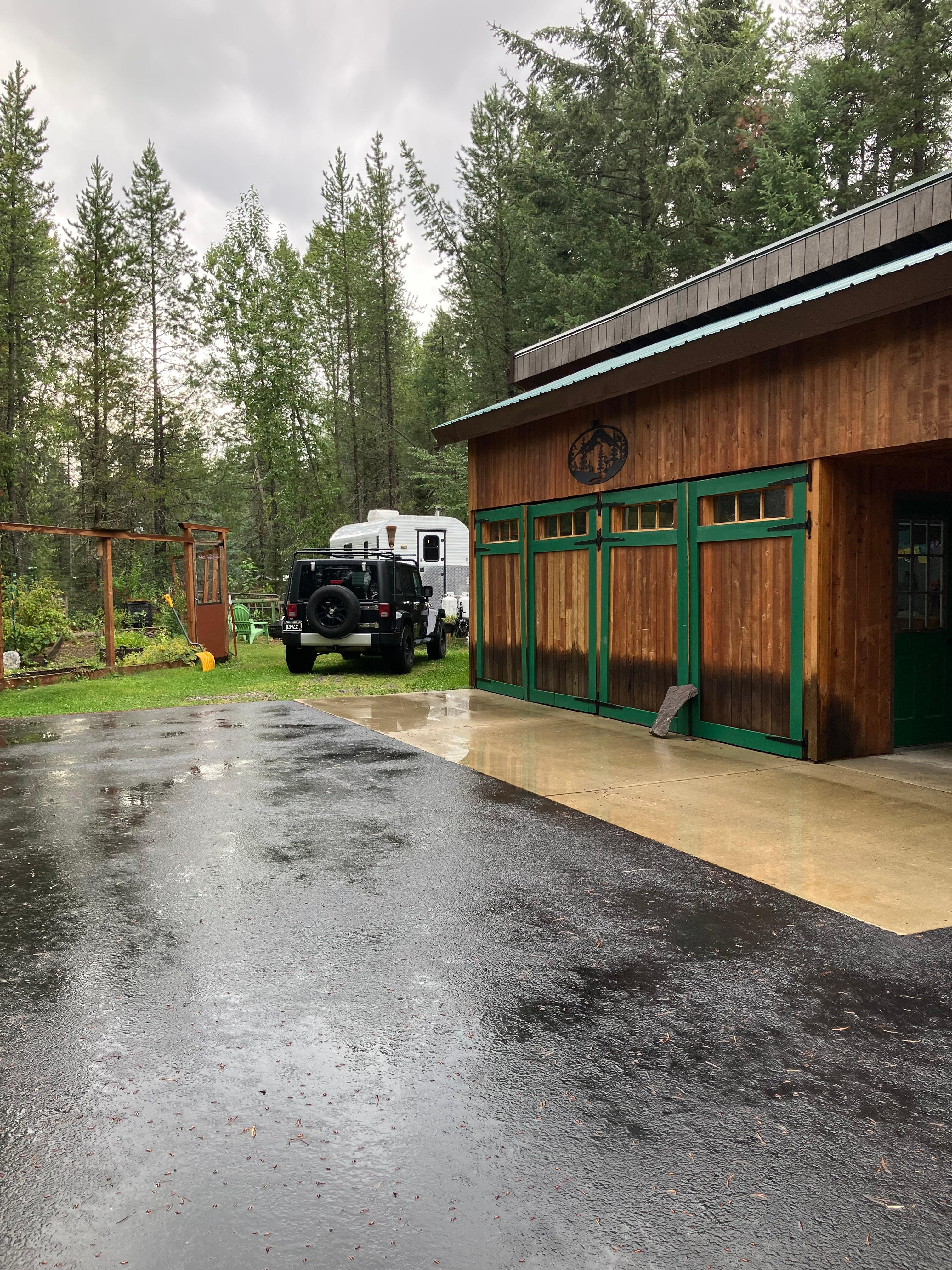 Cozy camper tucked in peaceful area