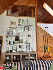 Gorgeous gallery wall in the high-ceilings great room